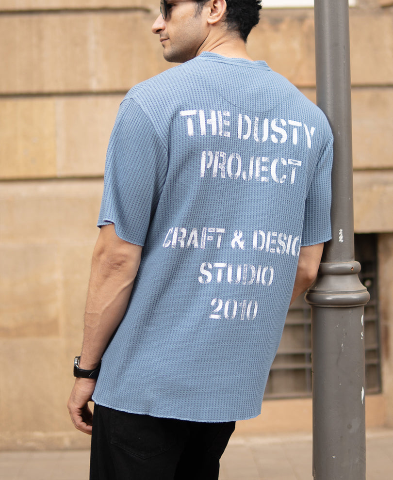Blue Structure Knit Henley T-Shirt.