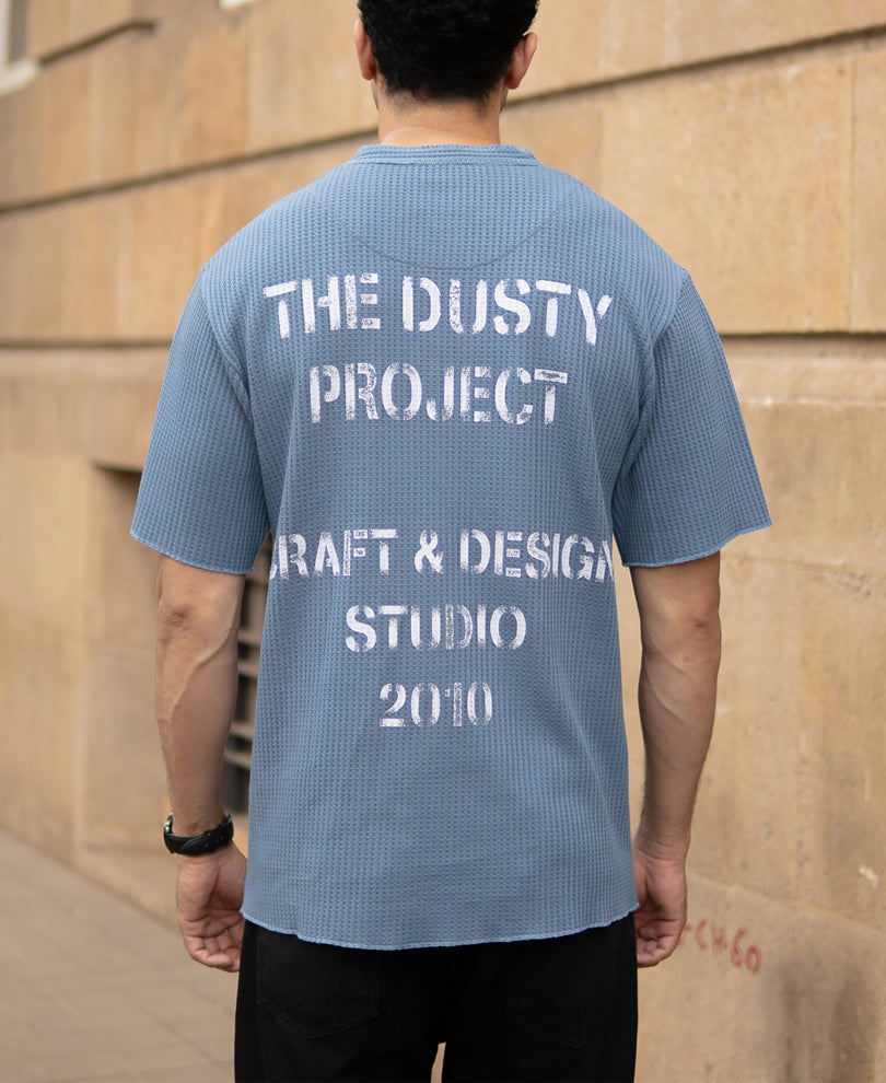 Blue Structure Knit Henley T-Shirt.