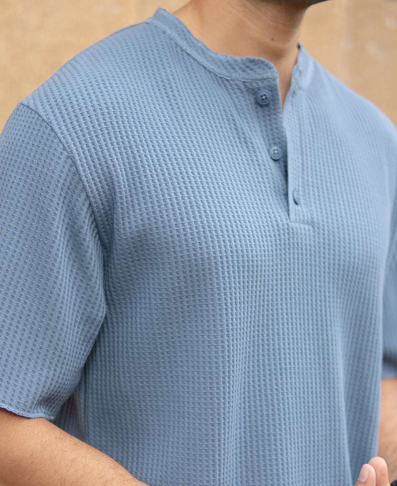 Blue Structure Knit Henley T-Shirt.