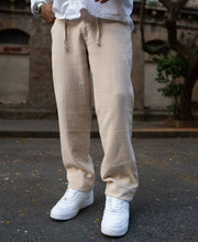 Beige Regular Fit Crinkled Trousers.