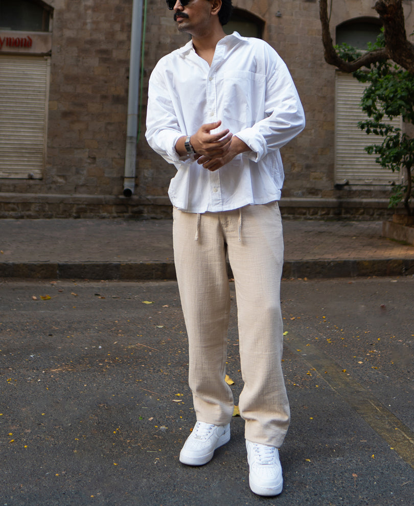 Beige Regular Fit Crinkled Trousers.