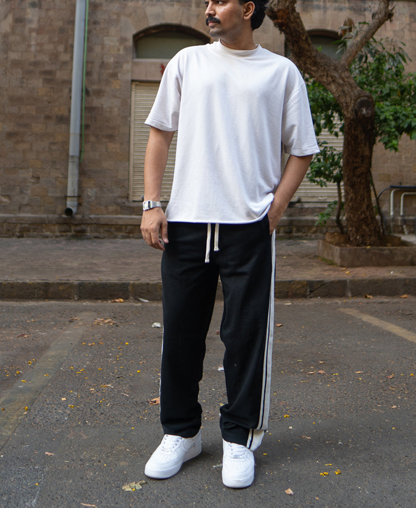 Black Trackpant With Contrast Patch.