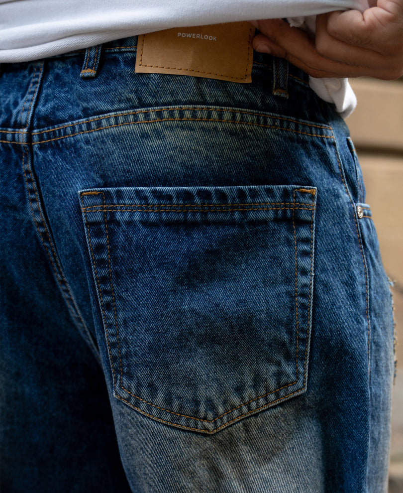 Dark Blue Baggy Distressed Jeans.