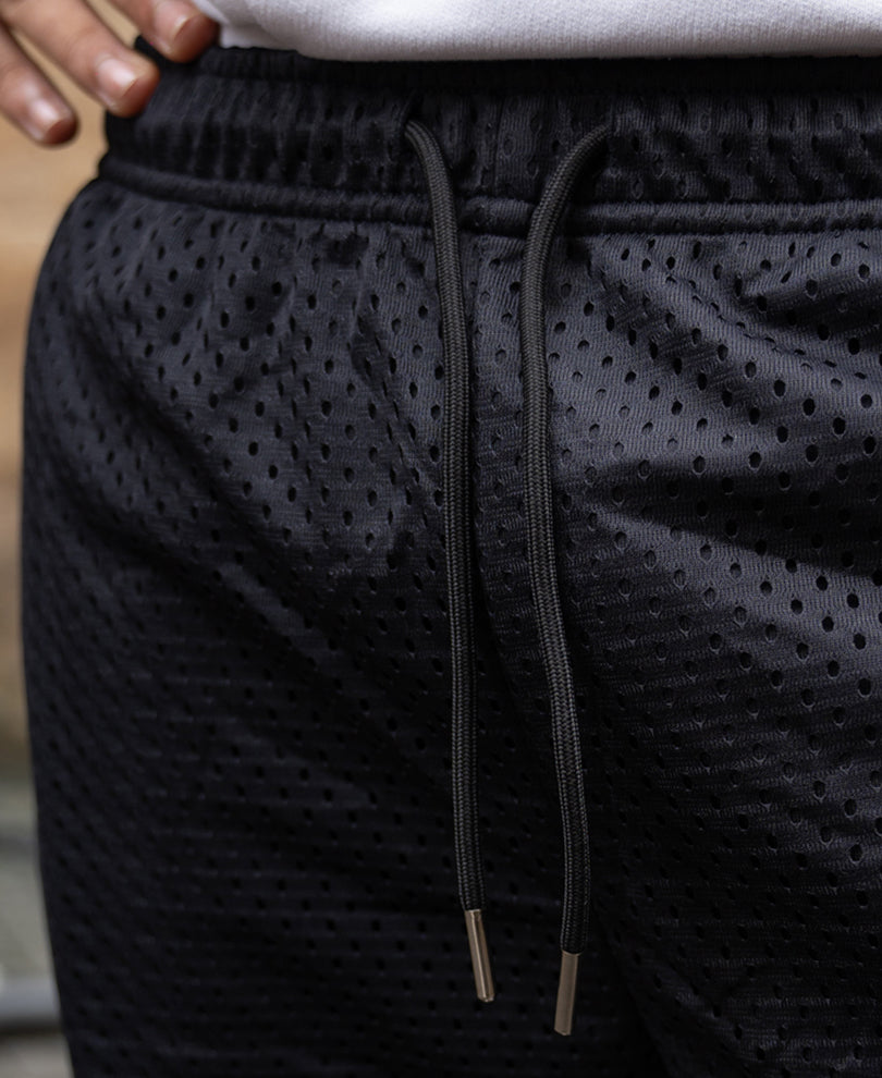 Black Contrast Embroidered Mesh Shorts.