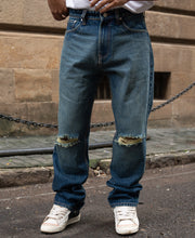 Dark Blue Distressed Baggy Jeans.