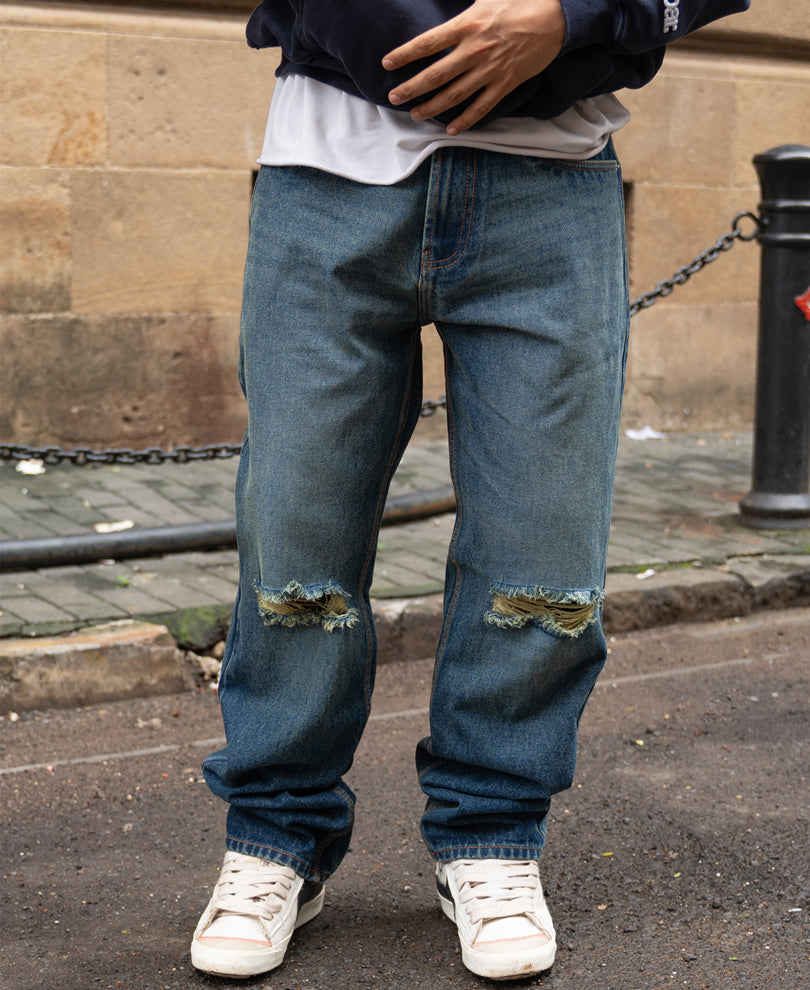 Dark Blue Distressed Baggy Jeans.