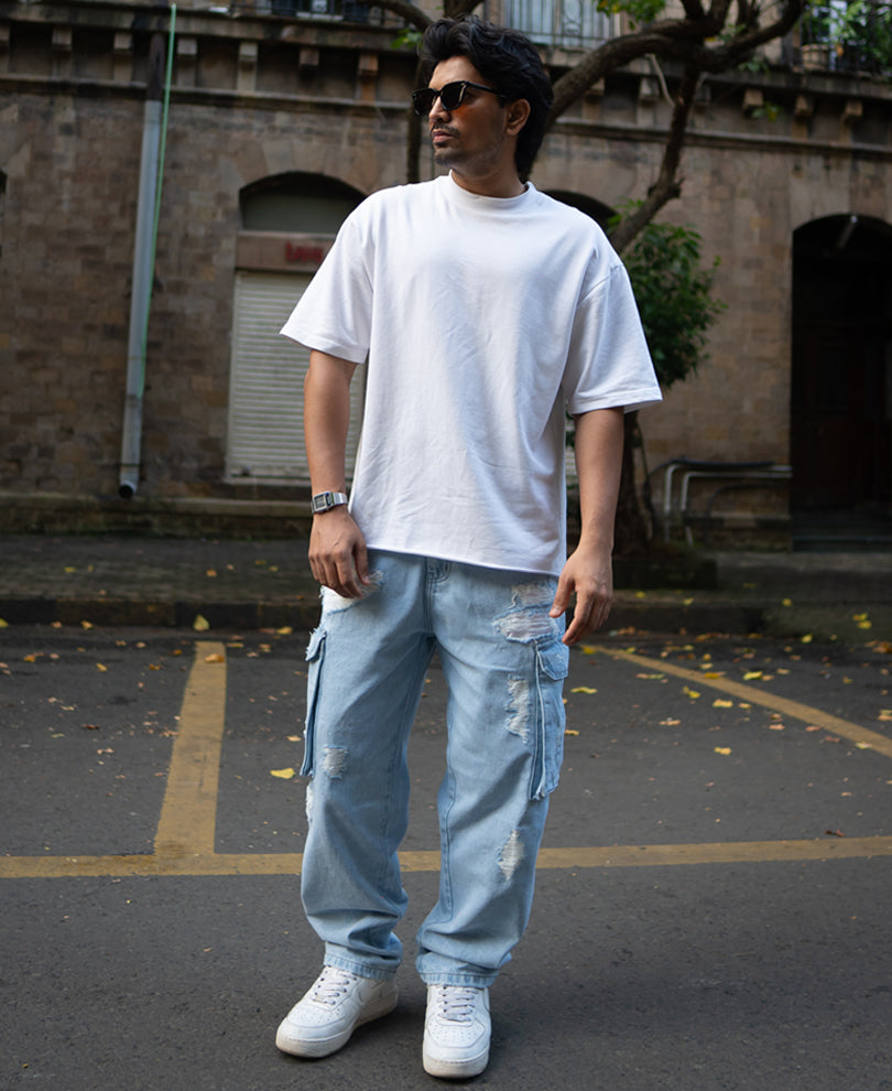 Ice Blue Baggy Fit Distressed Cargo Jeans.