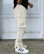 Beige Overdyed Cotton Cargo Pants.