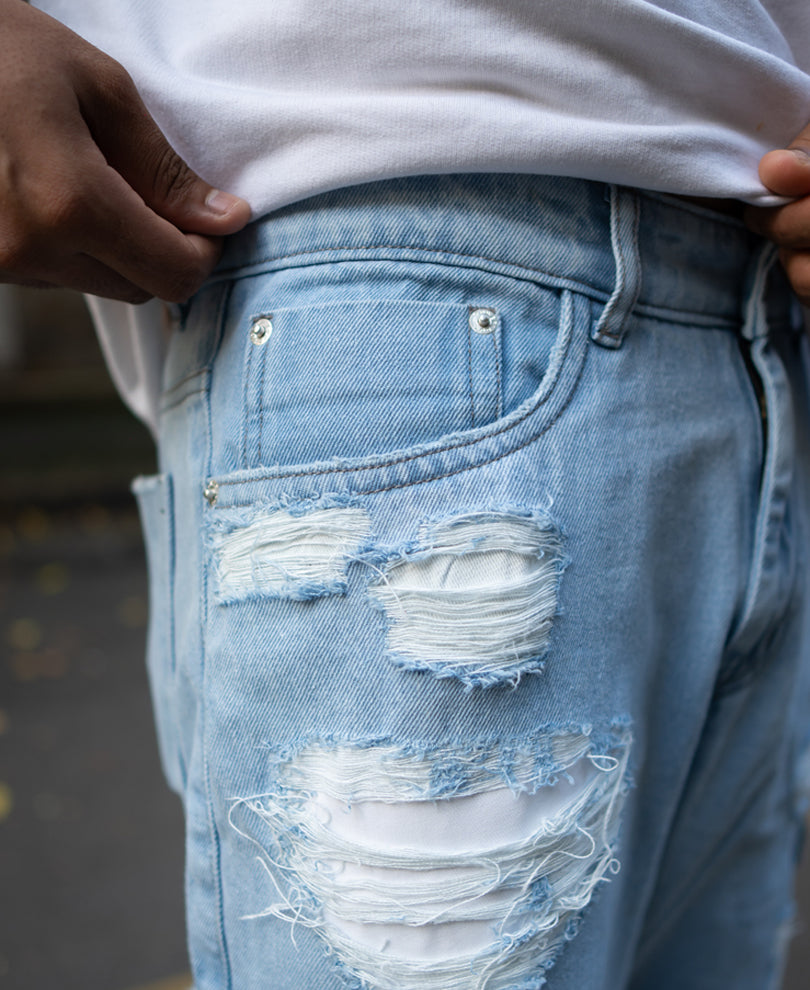 Ice Blue Baggy Fit Distressed Cargo Jeans.