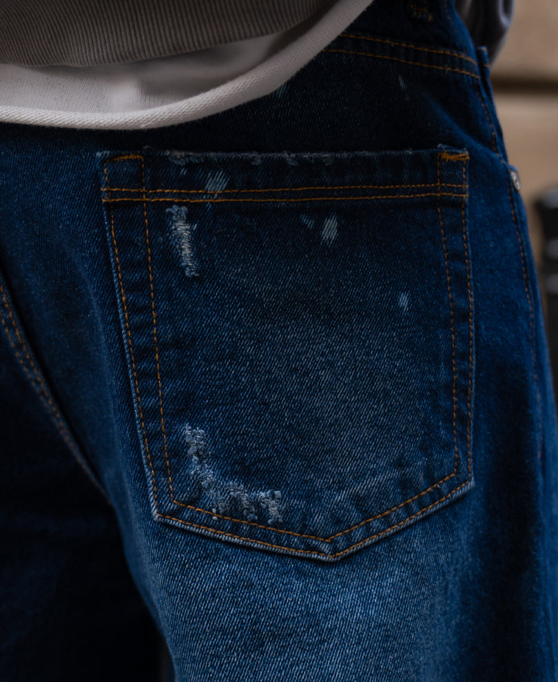 Dark Blue Distressed Baggy Fit Jeans.