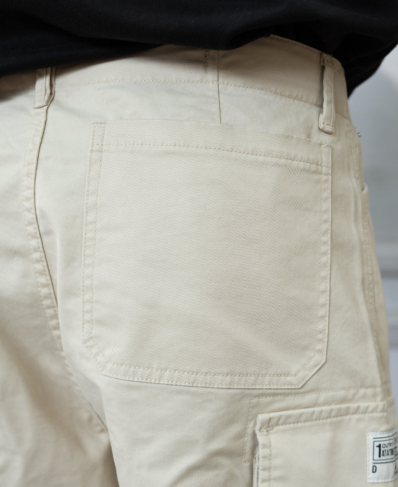 Beige Overdyed Cotton Cargo Pants.
