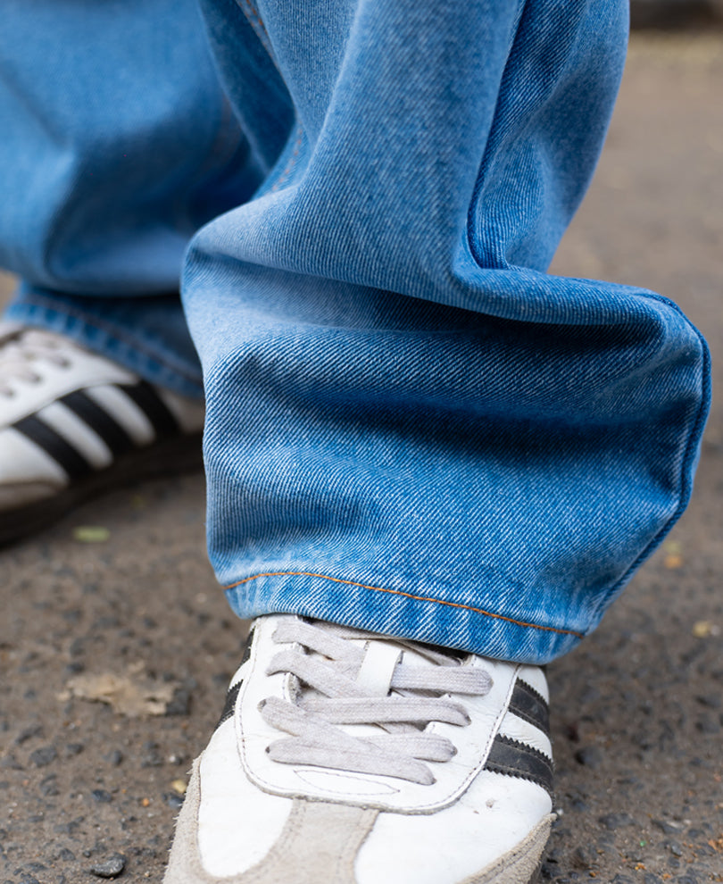 Mid Blue Washed Baggy Fit Jeans.