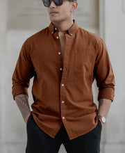 Tan Oxford Shirt.