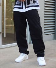 Black Solid Washed Baggy Fit Denim Jeans.